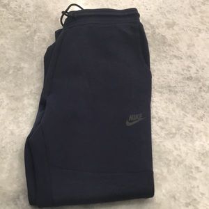 Nike tech fleece pants in a size small in navy